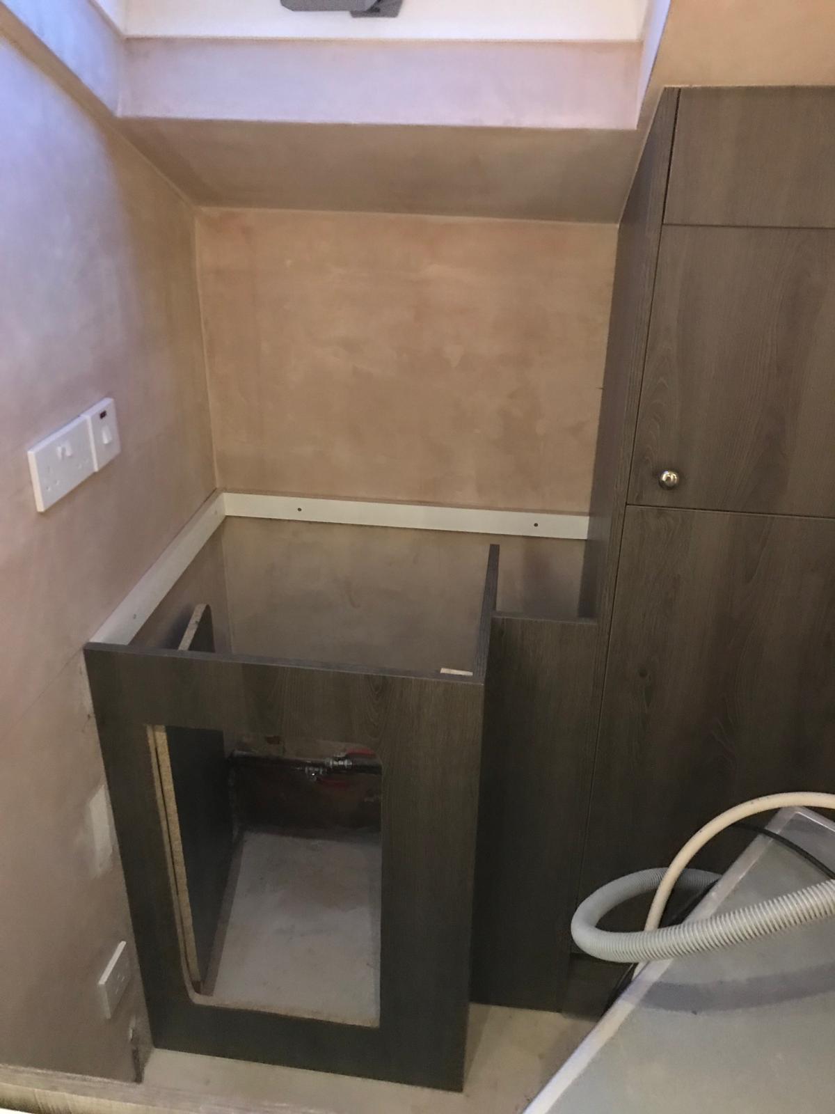 Utility room project cupboard installation