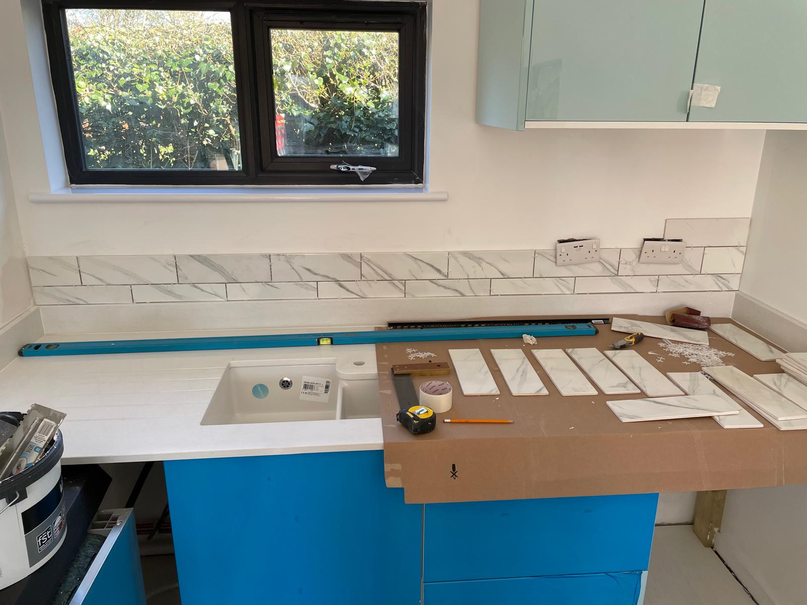 Wall Tile installation around sink area on conversion project