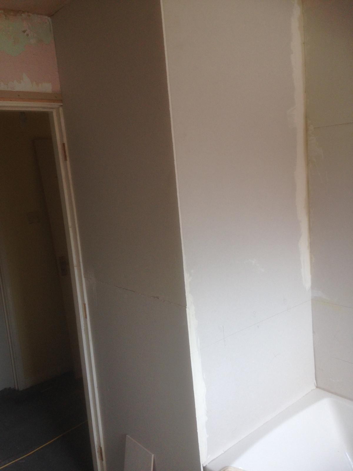 Wall preparation for bathroom tile installation 