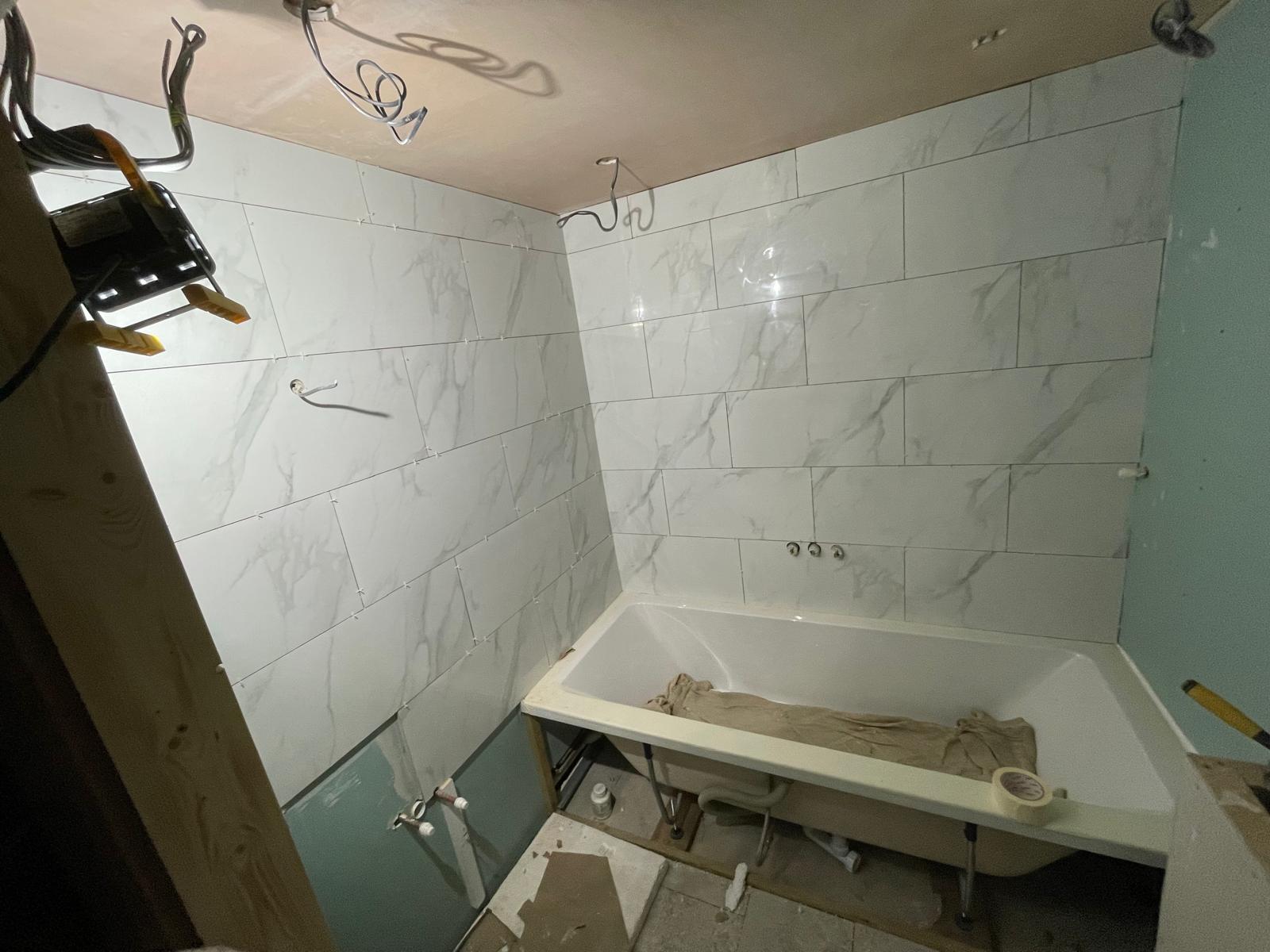 Wall tile and bath installation on a conversion project in Kent