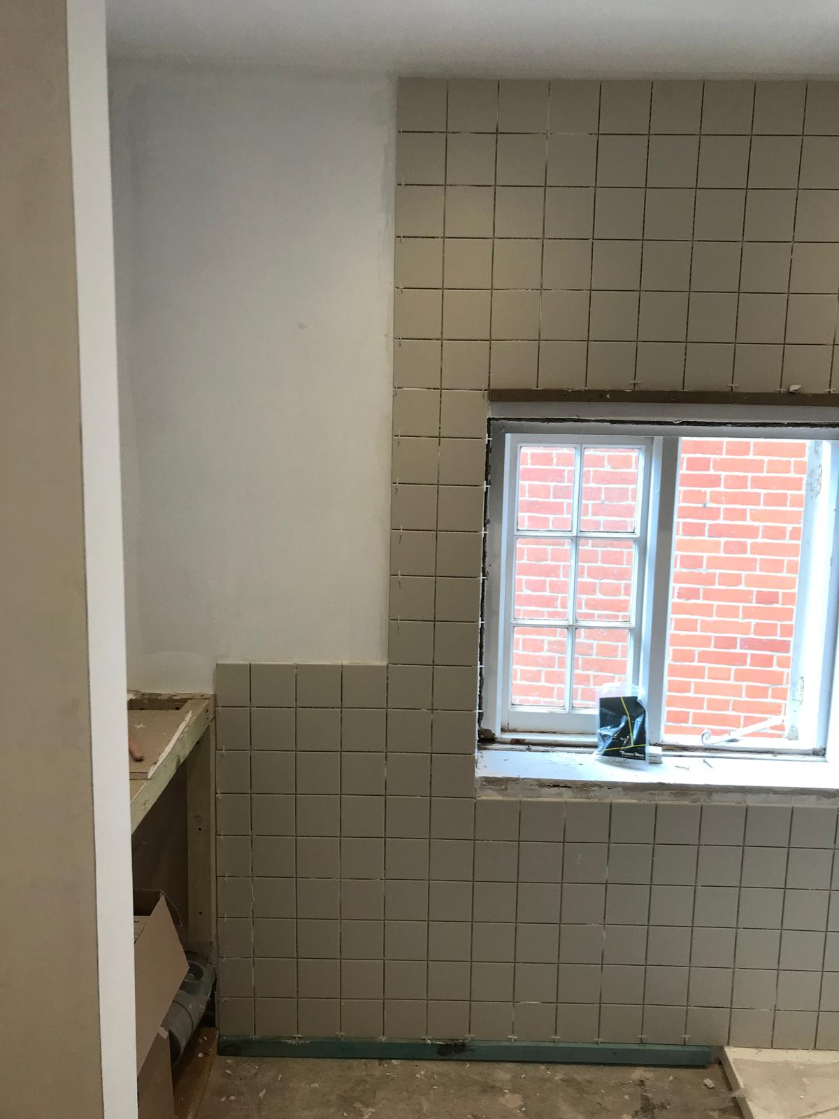 Wall tile installation on a local bathroom project