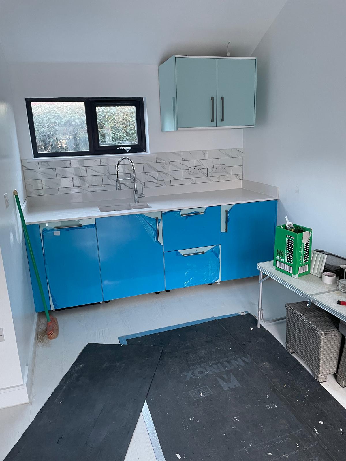 Wall tiles installed and tap installed on a conversion project in Kent