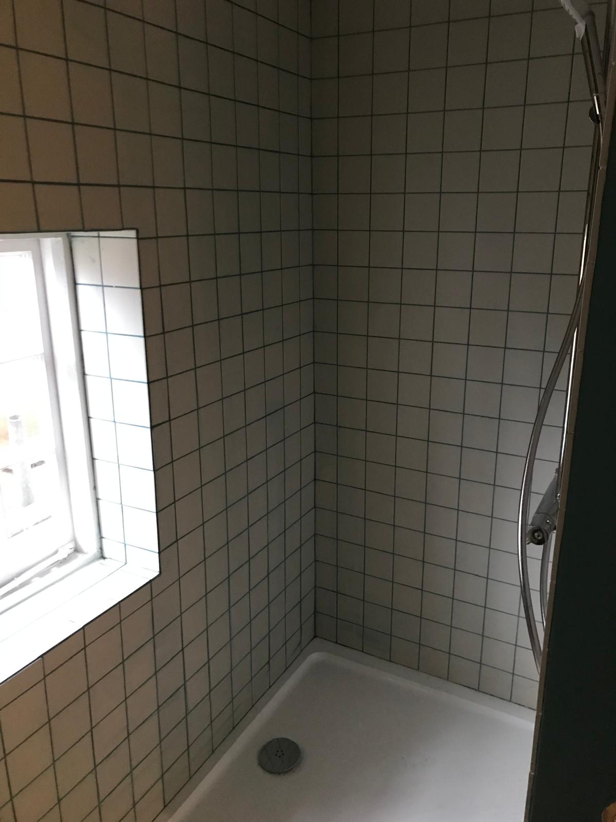 White wall tile installation in shower area on a local bathroom project in Kent