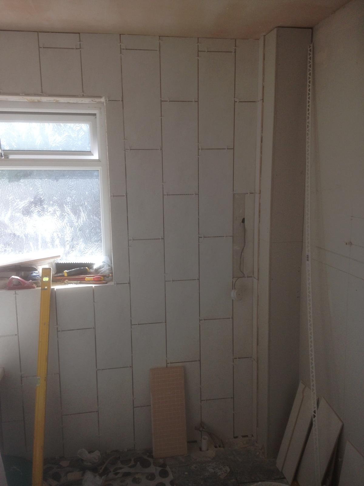 White wall tile installation on a local bathroom project in Kent 
