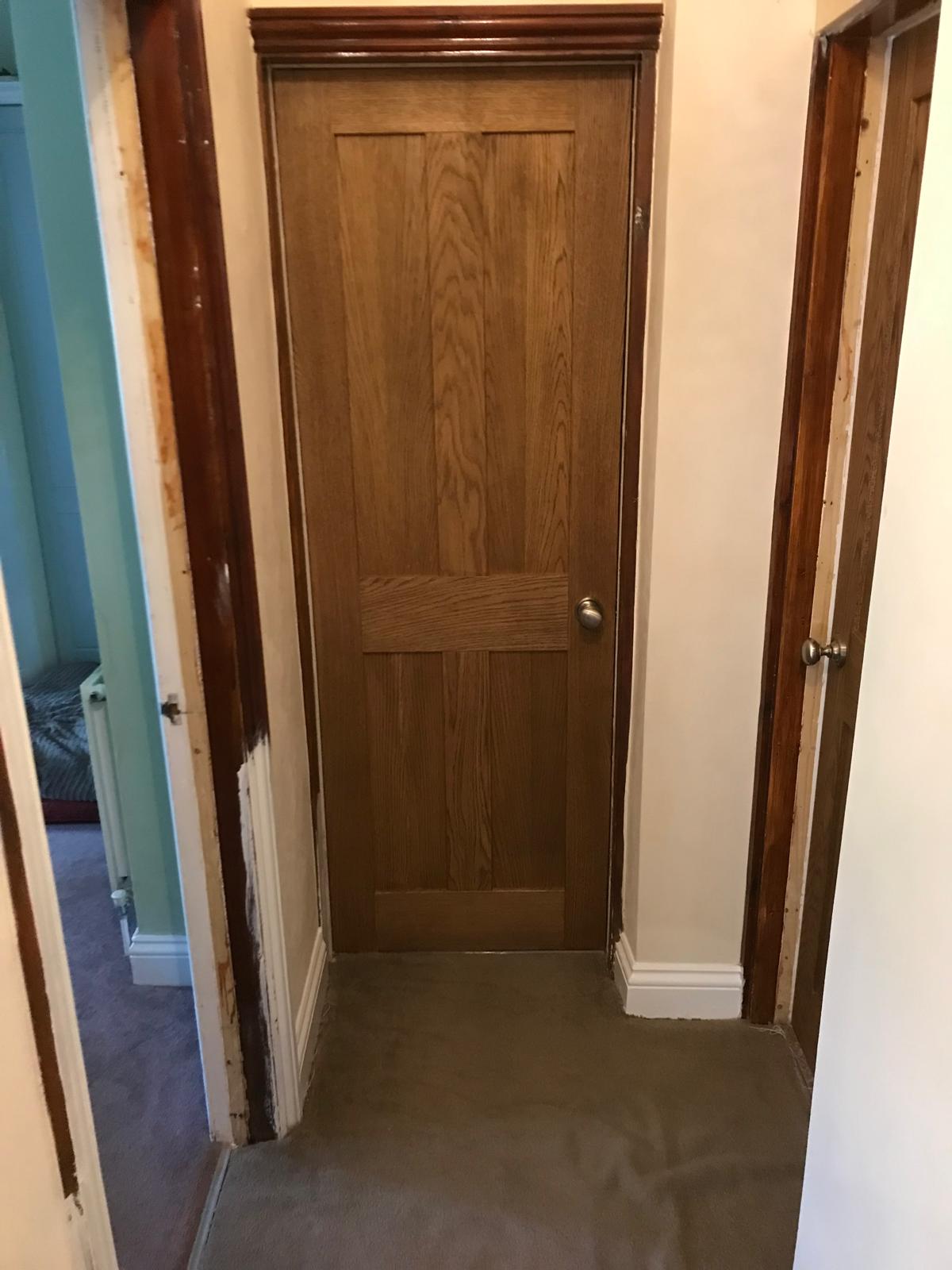 Wooden effect door installation