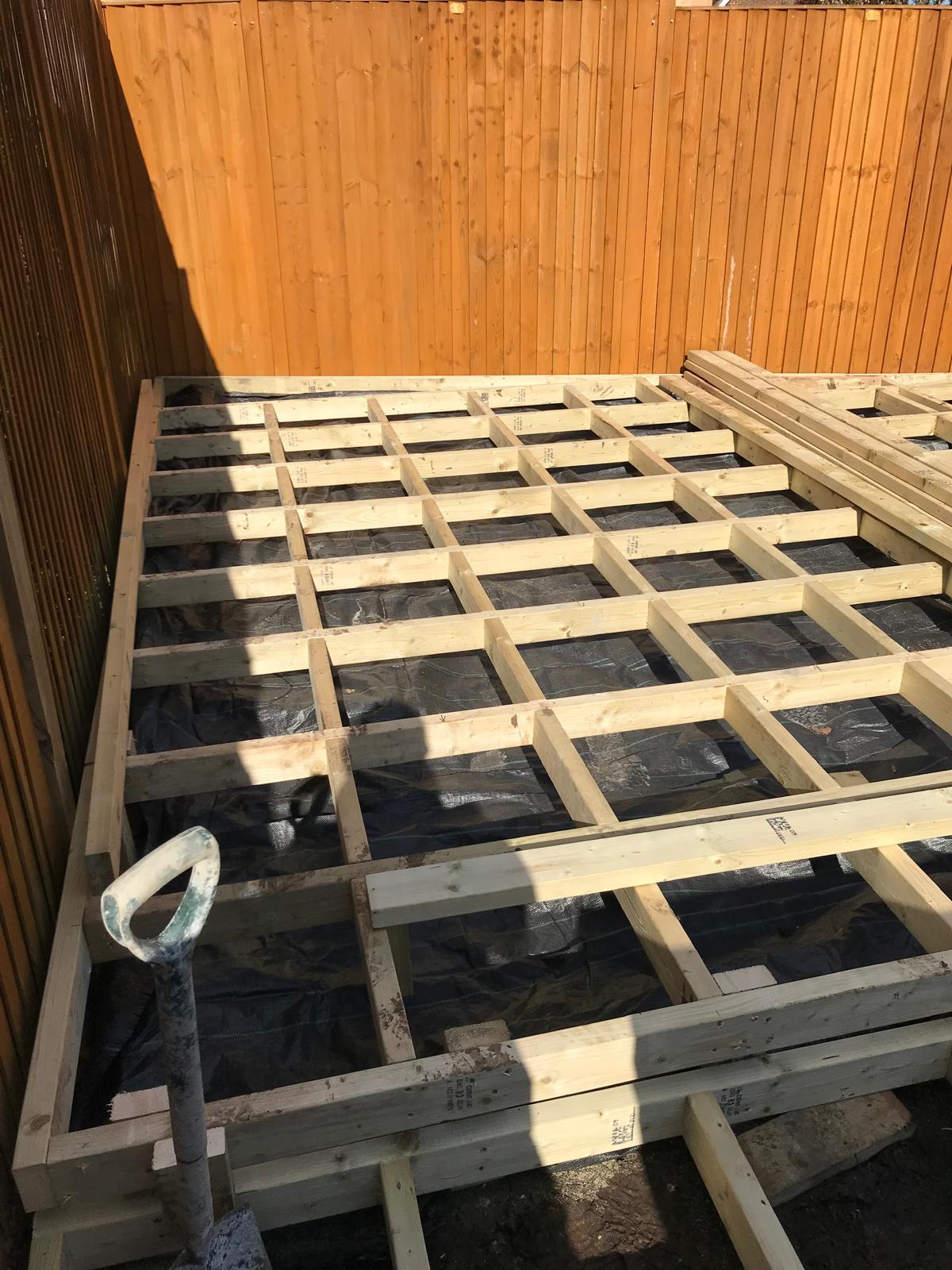 Wooden frame being installed for decking installation