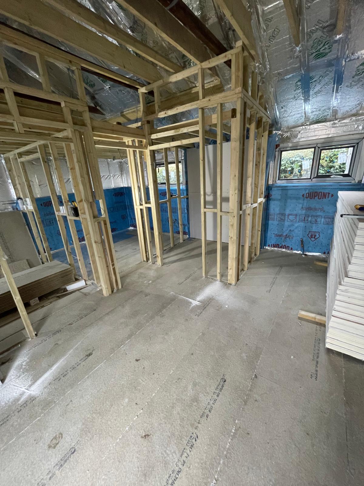 Wooden frame stud work with insulation installation for a conversion project in Kent