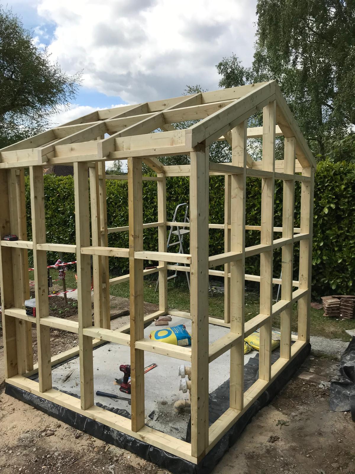 Wooden structure on a custom shed build landscaping project