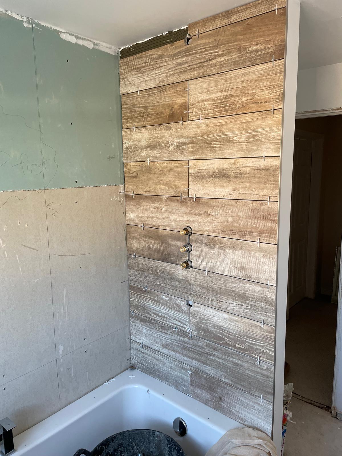 Wooden wall tile installation for local bathroom project