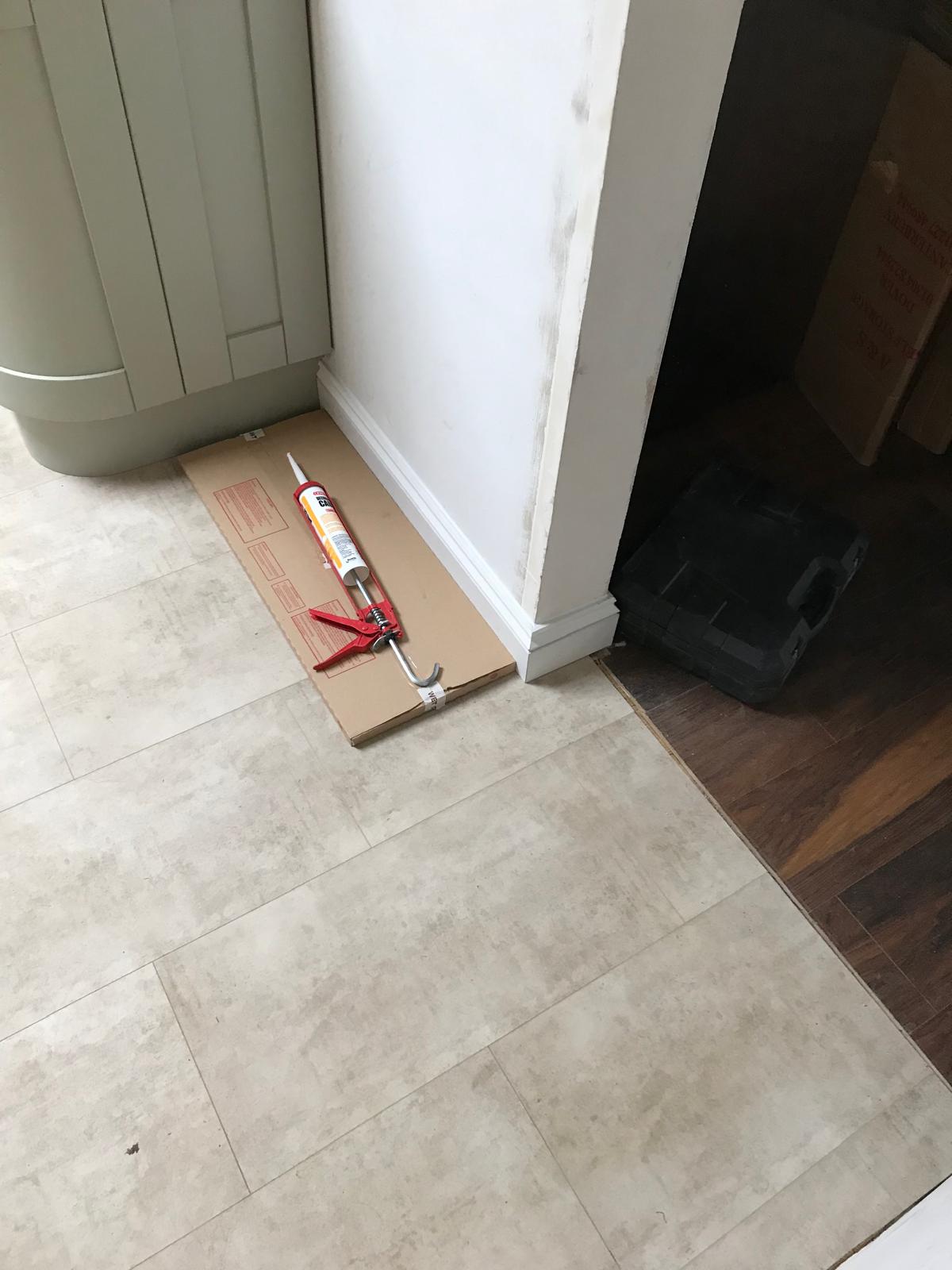 laminate floor installed up to door frame